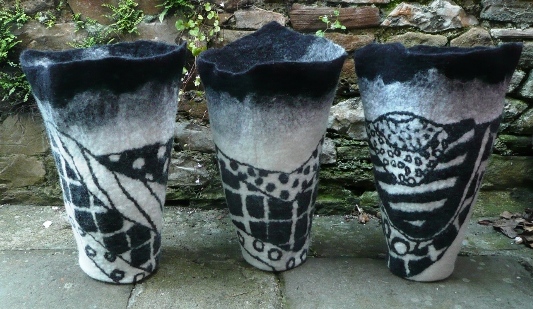 three felted vessels
